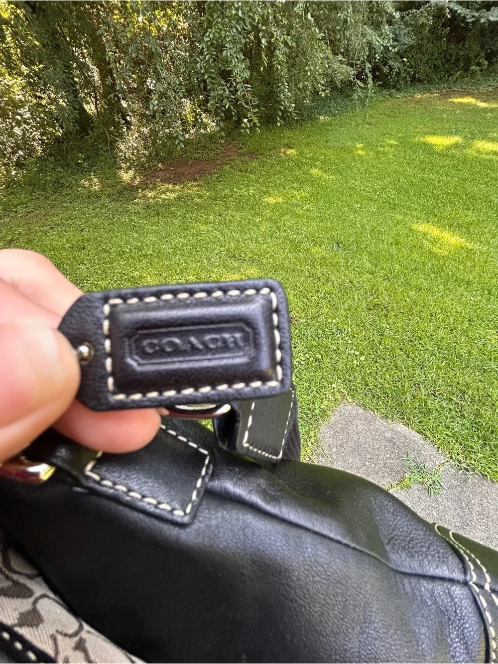 Classic Black Leather Backpack with Silver Buckle